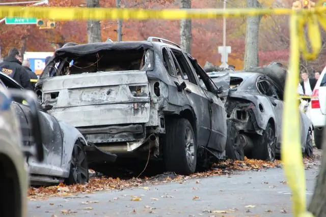 Arsonists torched three cars and tried to burn a fourth yesterday in Midwood